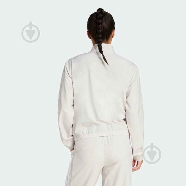 Вітрівка жіноча Adidas WE 3S WOVEN JKT WONALU/WHITE JE6173 р.M бежева - фото 2 Вітрівка жіноча Adidas WE 3S WOVEN JKT WONALU/WHITE JE6173 р.M бежева - фото 2