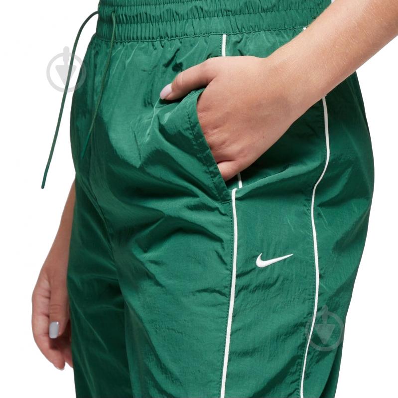 Штани Nike NSNK WR WVN HR OH PANT FV7655-300 р. L зелений - фото 3