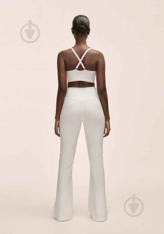 Штани Casall Grace Flare Slit Pant 25059-001 р. L білий - фото 3 Штани Casall Grace Flare Slit Pant 25059-001 р. L білий - фото 3