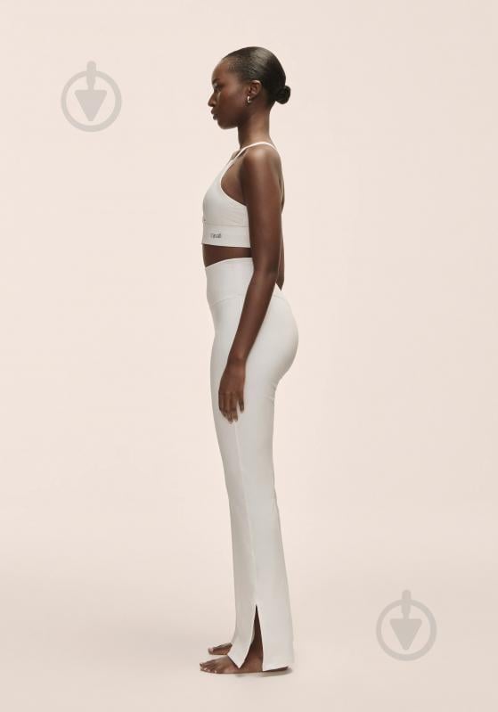 Штани Casall Grace Flare Slit Pant 25059-001 р. M білий - фото 4 Штани Casall Grace Flare Slit Pant 25059-001 р. M білий - фото 4