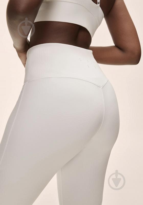 Штани Casall Grace Flare Slit Pant 25059-001 р. S білий - фото 5 Штани Casall Grace Flare Slit Pant 25059-001 р. S білий - фото 5