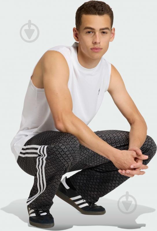 Брюки Adidas Firebird Tp Black KC9159 р. S черный - фото 3 Брюки Adidas Firebird Tp Black KC9159 р. S черный - фото 3