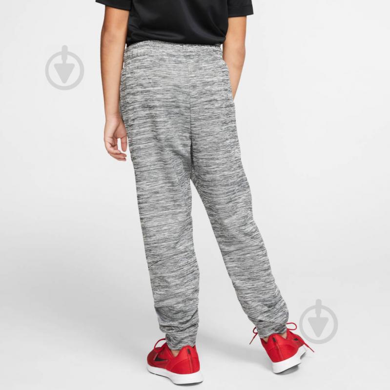 Брюки Nike B NK THERMA TAPR PANT GFX CJ7830-010 р. L черный - фото 5