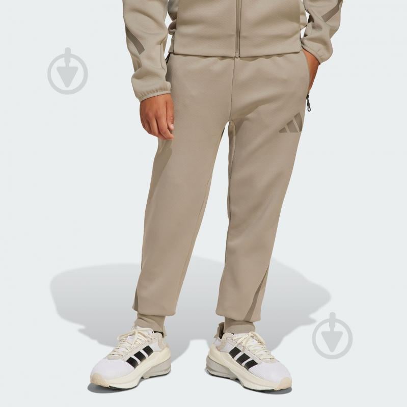 Брюки Adidas J Z.N.E. PT JD0007 р. 9-10YRS зеленый - фото 1
