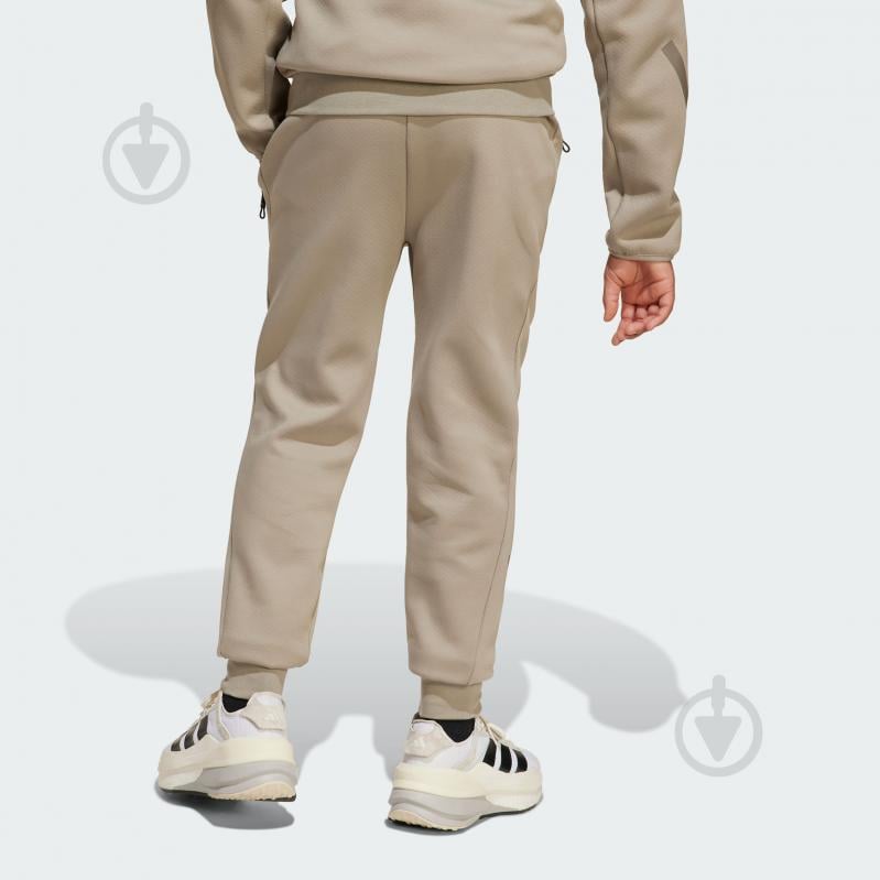 Брюки Adidas J Z.N.E. PT JD0007 р. 9-10YRS зеленый - фото 2