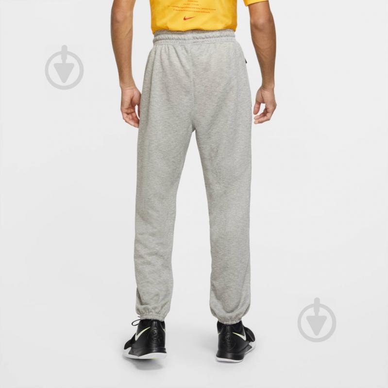 Штани Nike M NK SPOTLIGHT PANT CK6442-063 р. 2XL світло-сірий - фото 3