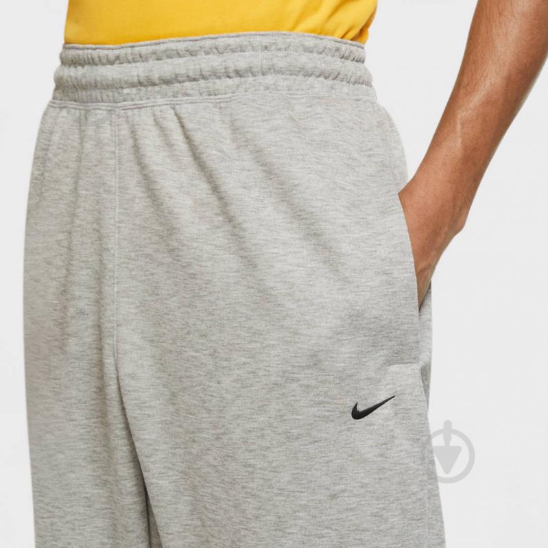 Брюки Nike M NK SPOTLIGHT PANT CK6442-063 р. L светло-серый - фото 4