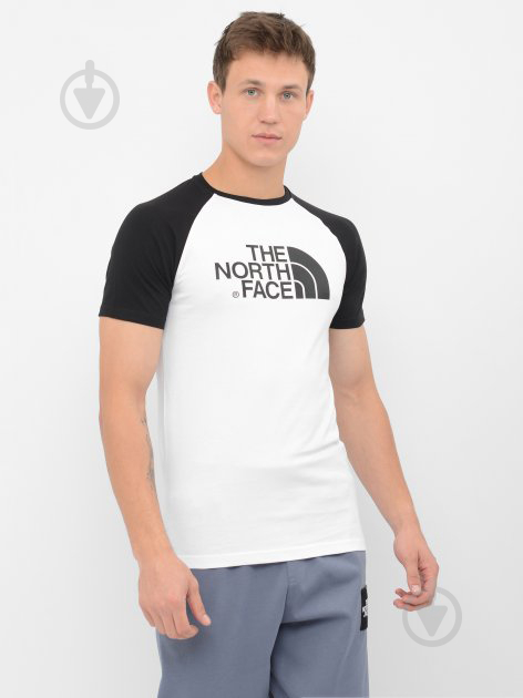 Футболка THE NORTH FACE M S/S RAGLAN EASY TEE - EU NF0A37FVLA91 р.S біло-чорний - фото 1