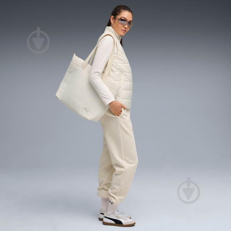 Жилет Puma ESS PADDED VEST 68522987 р.XS бежевий - фото 3 Жилет Puma ESS PADDED VEST 68522987 р.XS бежевий - фото 3