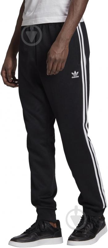 Брюки Adidas SST TP P BLUE GF0210 р. M черный - фото 1 Брюки Adidas SST TP P BLUE GF0210 р. M черный - фото 1