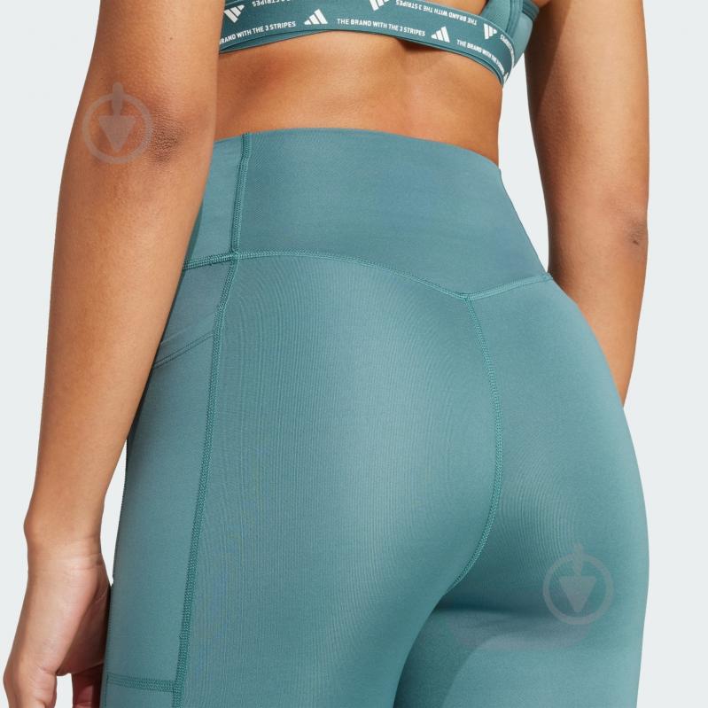 Лосини Adidas OPT ESS ST 1/1 JW7645 р.M зелений - фото 4 Лосини Adidas OPT ESS ST 1/1 JW7645 р.M зелений - фото 4