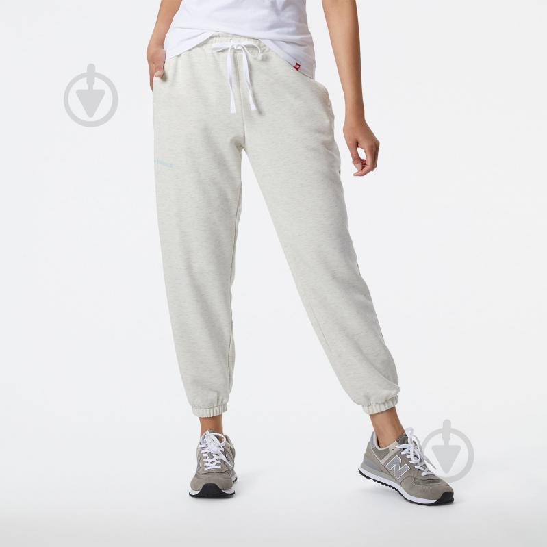 Штани New Balance WP21554SAH р. M білий - фото 1 Штани New Balance WP21554SAH р. M білий - фото 1
