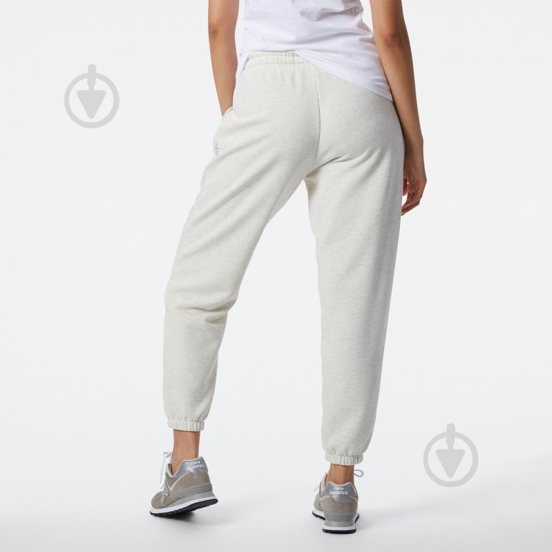 Штани New Balance WP21554SAH р. M білий - фото 3 Штани New Balance WP21554SAH р. M білий - фото 3