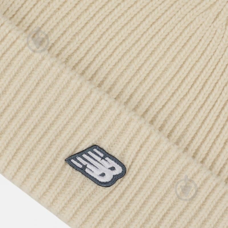 Шапка New Balance LAH53008PEF р.os бежевый - фото 3