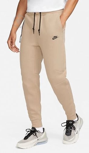 Брюки Nike M NK TCH FLC JGGR FB8002-247 р. S бежевый - фото 1