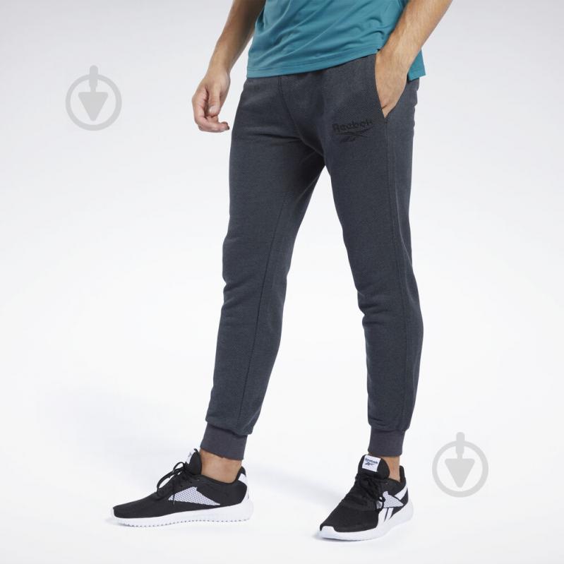 Брюки Reebok TE MELANGE PANT FJ4686 р. L черный - фото 1