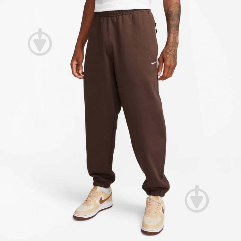 Брюки Nike NK SOLO SWSH FLC CF PANT DX1364-237 р. L коричневый - фото 1