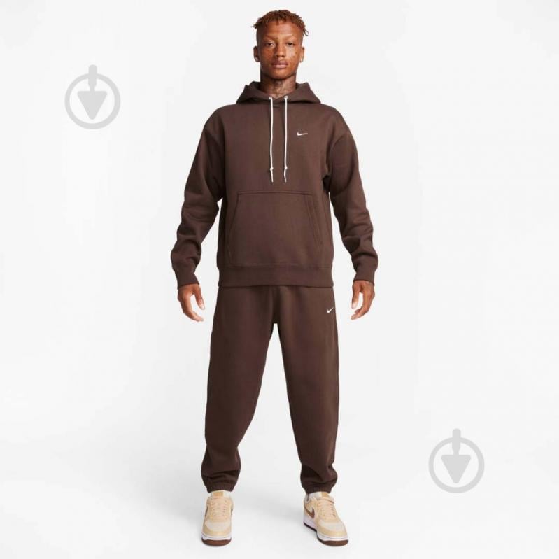 Штани Nike NK SOLO SWSH FLC CF PANT DX1364-237 р. M коричневий - фото 6 Штани Nike NK SOLO SWSH FLC CF PANT DX1364-237 р. M коричневий - фото 6
