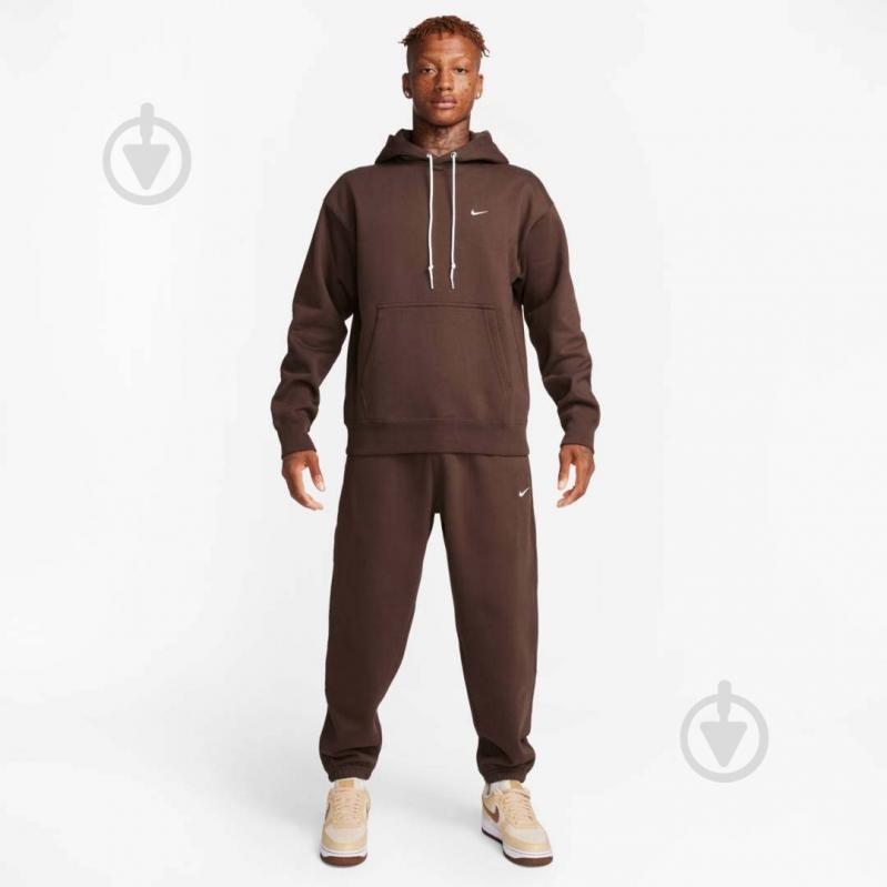 Штани Nike NK SOLO SWSH FLC CF PANT DX1364-237 р. S коричневий - фото 6