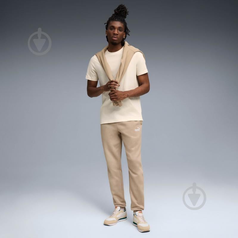 Штани Puma ESS No. 1 Logo Sweatpants FL cl (s) 68260755 р. S бежевий - фото 3 Штани Puma ESS No. 1 Logo Sweatpants FL cl (s) 68260755 р. S бежевий - фото 3