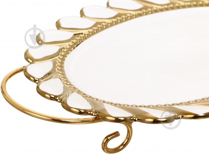 Блюдо овальное Fiora на металлической подставке Savoiardi 30х21,5х3 см фарфор - фото 3 Блюдо овальное Fiora на металлической подставке Savoiardi 30х21,5х3 см фарфор - фото 3