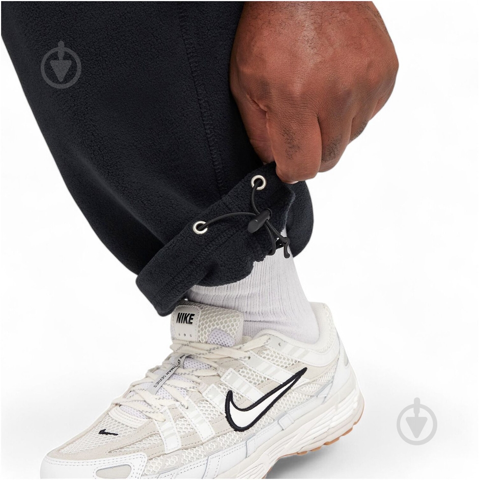 Брюки Nike Nk Club Ssnl Winterized Pant FZ0899-010 р. S черный - фото 5 Брюки Nike Nk Club Ssnl Winterized Pant FZ0899-010 р. S черный - фото 5