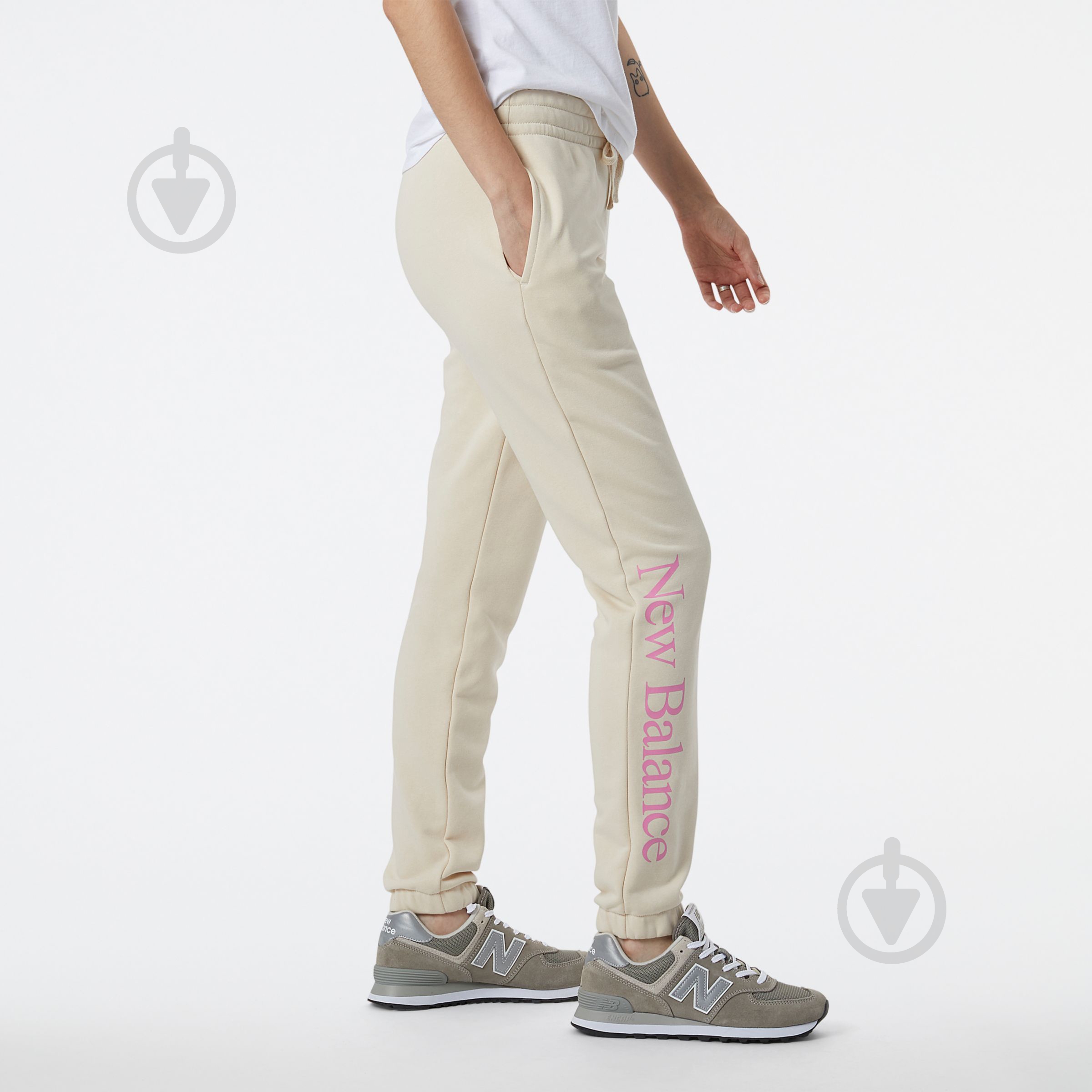 Брюки New Balance ESSENTIALS CELEBRATE WP21508CTU р. XS бежевый - фото 2