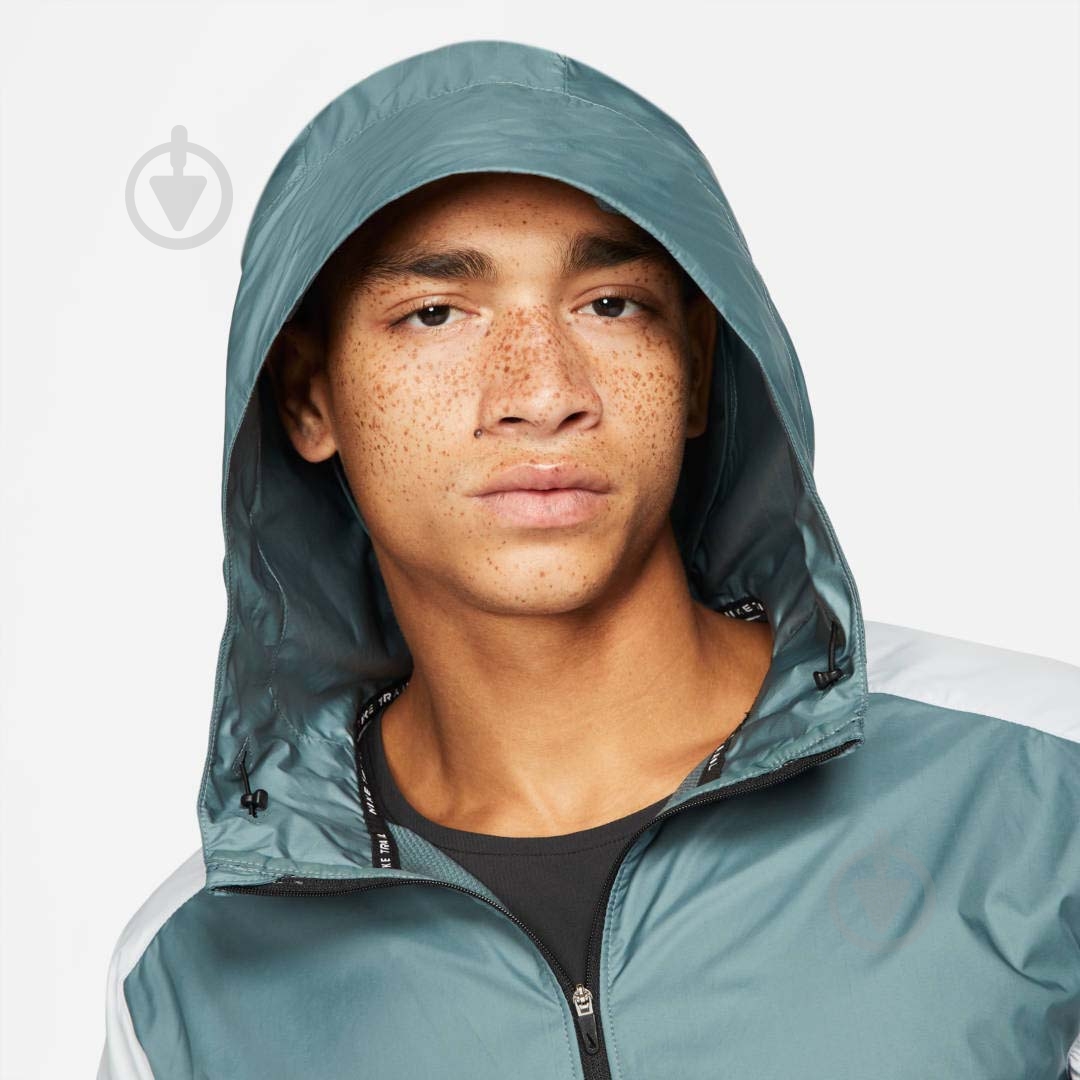 Ветровка мужская весенняя Nike M NK SF TRAIL WINDRUNNER JKT CZ9054-387 р.L серая - фото 4 Ветровка мужская весенняя Nike M NK SF TRAIL WINDRUNNER JKT CZ9054-387 р.L серая - фото 4