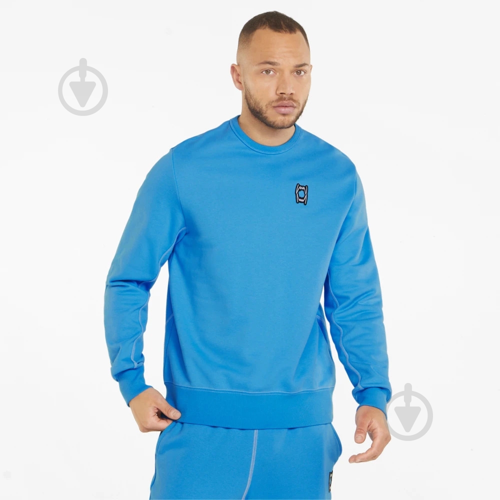 Свитшот Puma PIVOT CREW EMB 53324909 р. S голубой - фото 1
