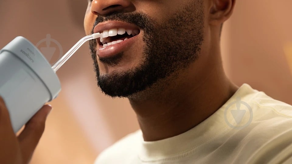 Ирригатор Philips Sonicare HX3333/24 Compact Flosser 1000 - фото 4