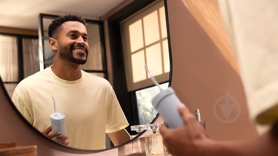 Ирригатор Philips Sonicare HX3333/24 Compact Flosser 1000 - фото 7