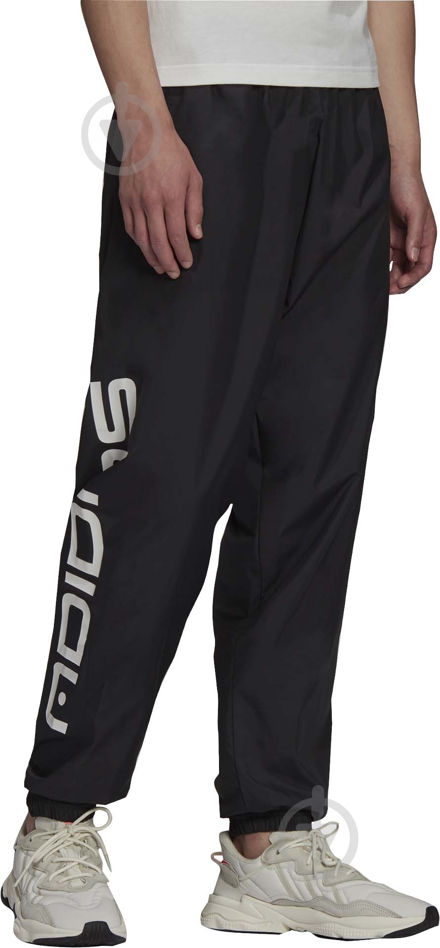 Брюки Adidas SYMBOL TP H13504 р. M черный - фото 1