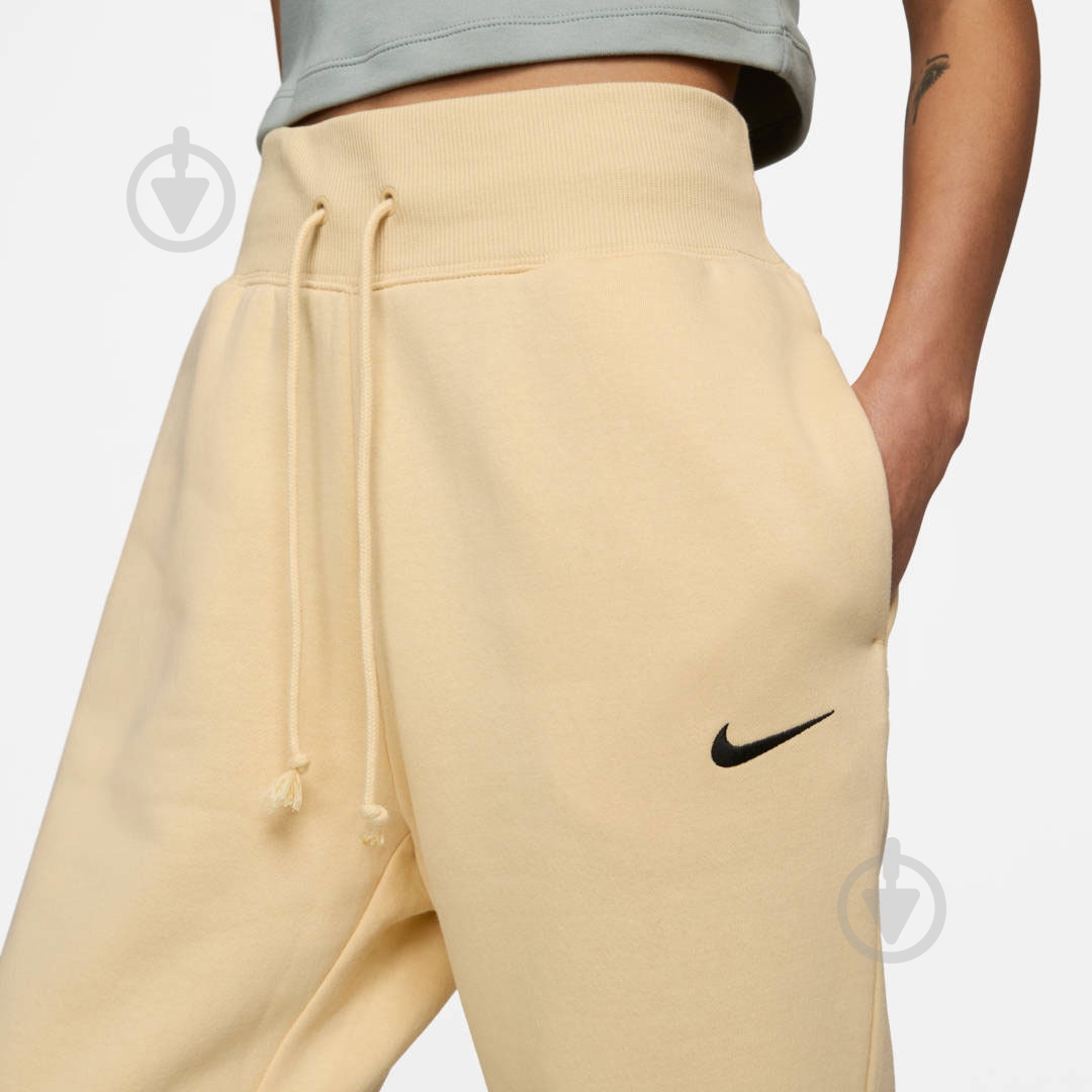 Брюки Nike FD0893-294 р. S бежевый - фото 3