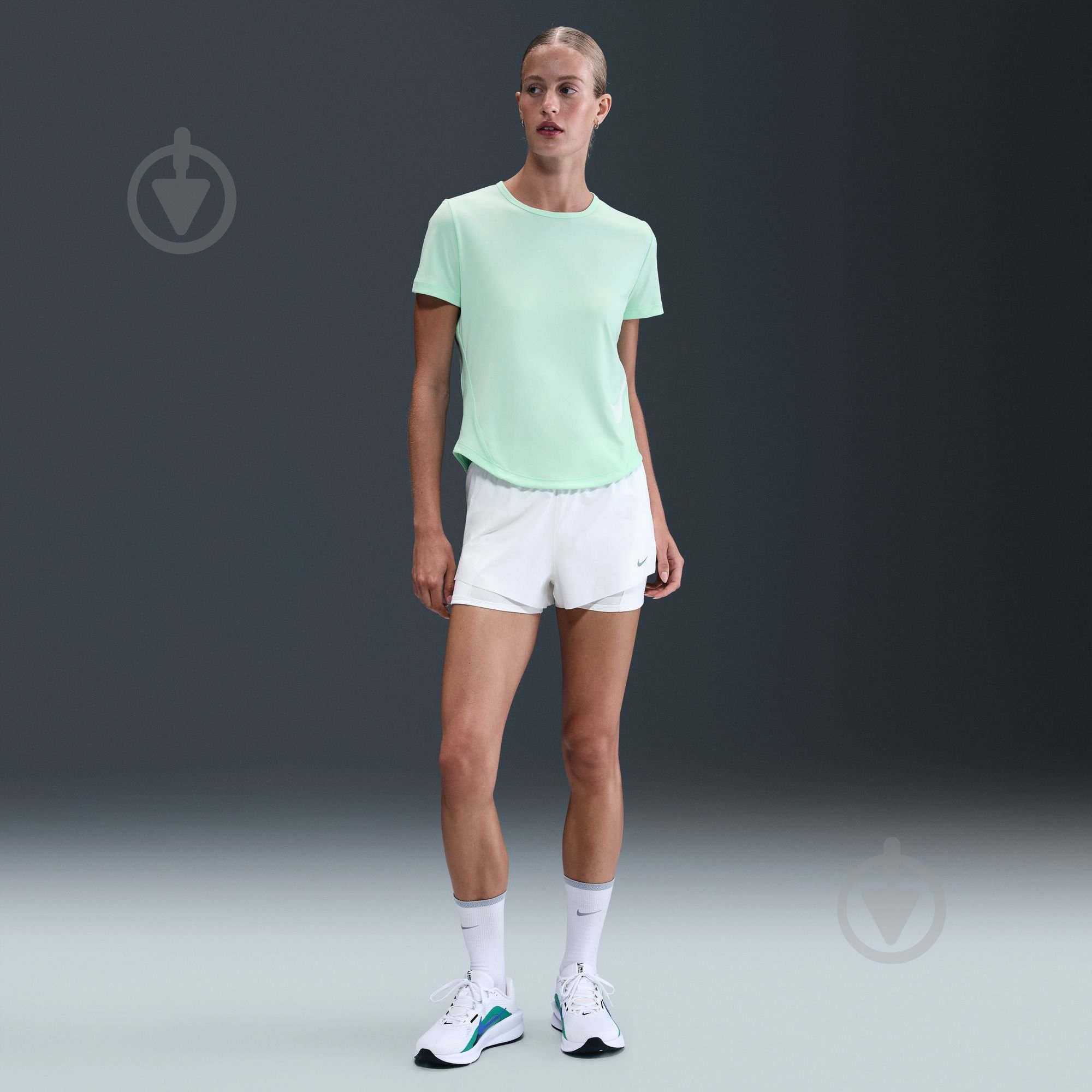 Майка Nike W NK TEMPO SWSH HBR DF SS TOP HV2772-353 р.L зеленый - фото 8 Майка Nike W NK TEMPO SWSH HBR DF SS TOP HV2772-353 р.L зеленый - фото 8