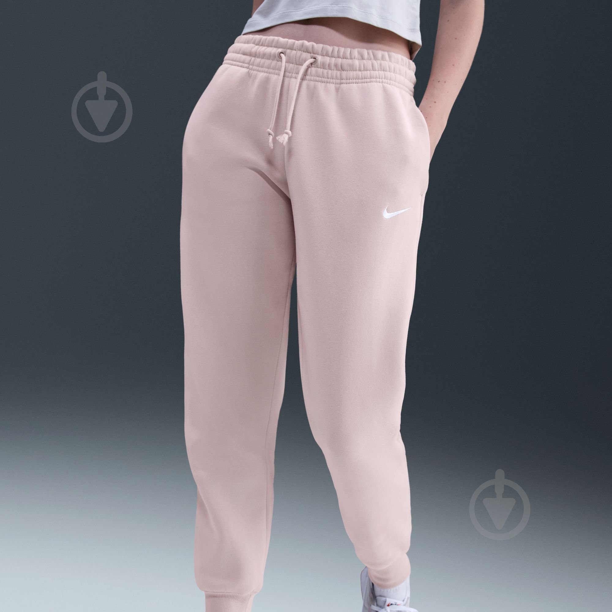 Штани Nike NSPHNX FLC MR FZ7626-667 р. L бежевий - фото 8 Штани Nike NSPHNX FLC MR FZ7626-667 р. L бежевий - фото 8