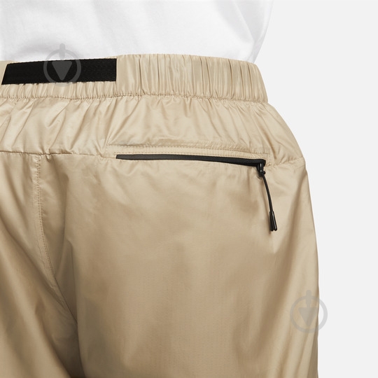 Брюки Nike M NK TCH WVN LND PANT FB7911-247 р. L бежевый - фото 7 Брюки Nike M NK TCH WVN LND PANT FB7911-247 р. L бежевый - фото 7