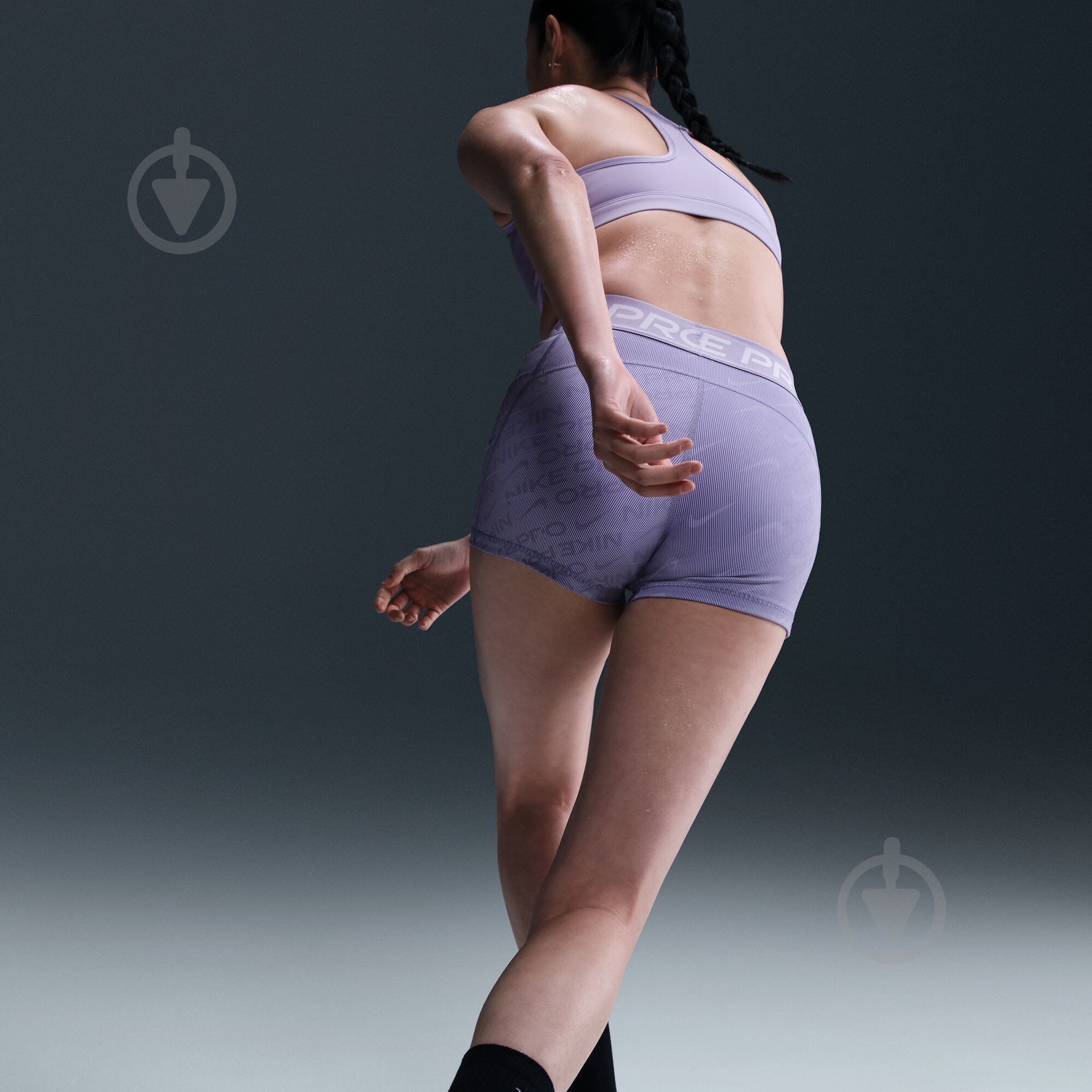 Лосини Nike W NP DF MR 3IN SHORT TT AOP HM6093-533 р.L фіолетовий - фото 11