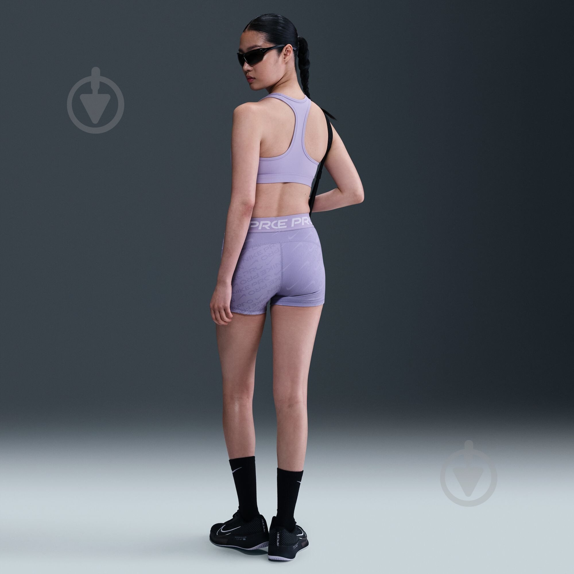 Лосины Nike W NP DF MR 3IN SHORT TT AOP HM6093-533 р.S фиолетовый - фото 7 Лосины Nike W NP DF MR 3IN SHORT TT AOP HM6093-533 р.S фиолетовый - фото 7