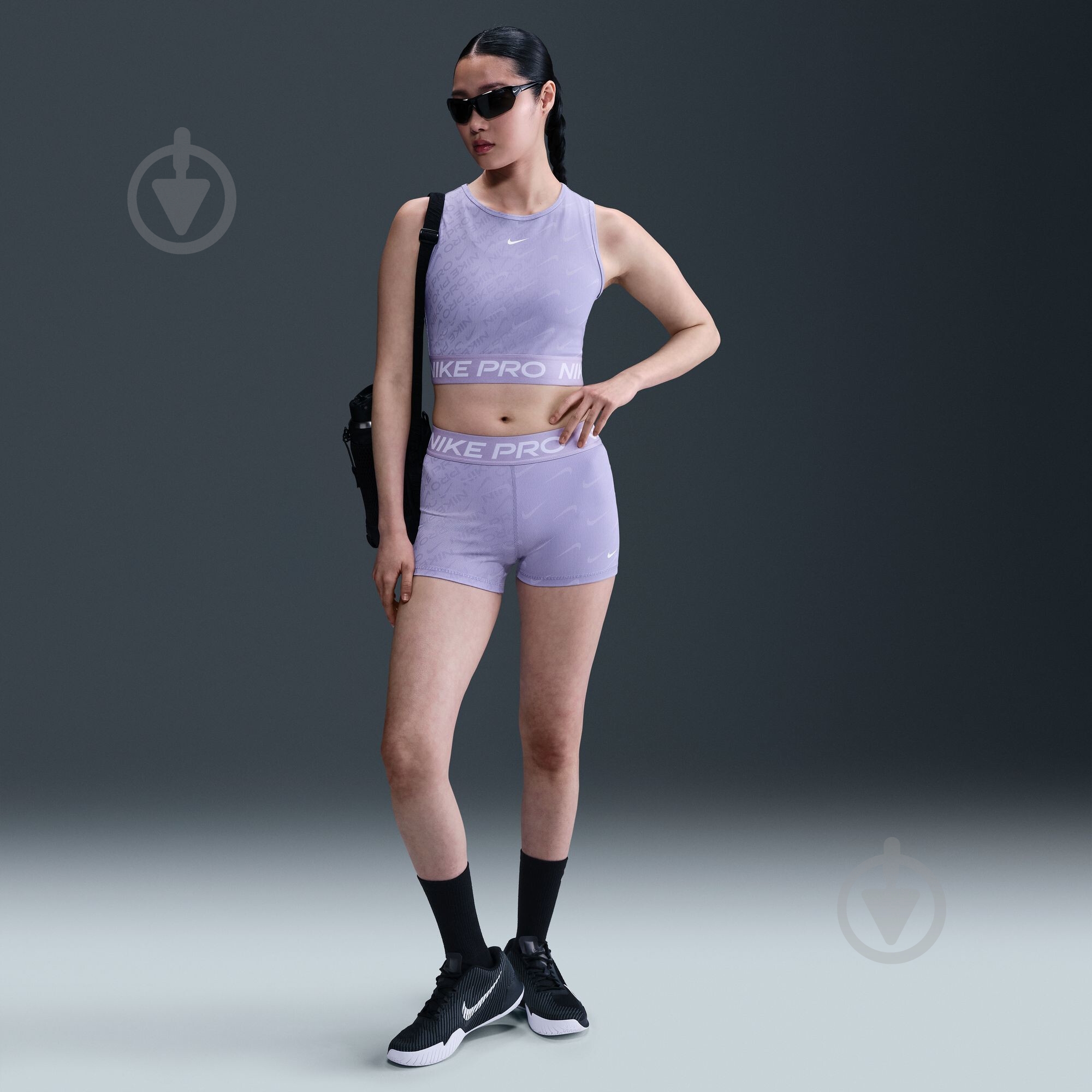 Топ Nike W NP DF CROP TANK AOP HQ5683-533 р.XL фіолетовий - фото 8 Топ Nike W NP DF CROP TANK AOP HQ5683-533 р.XL фіолетовий - фото 8