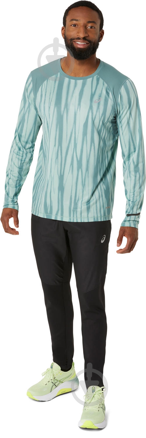 Штани Asics ROAD PANT 2011D097-001 р. S чорний - фото 7