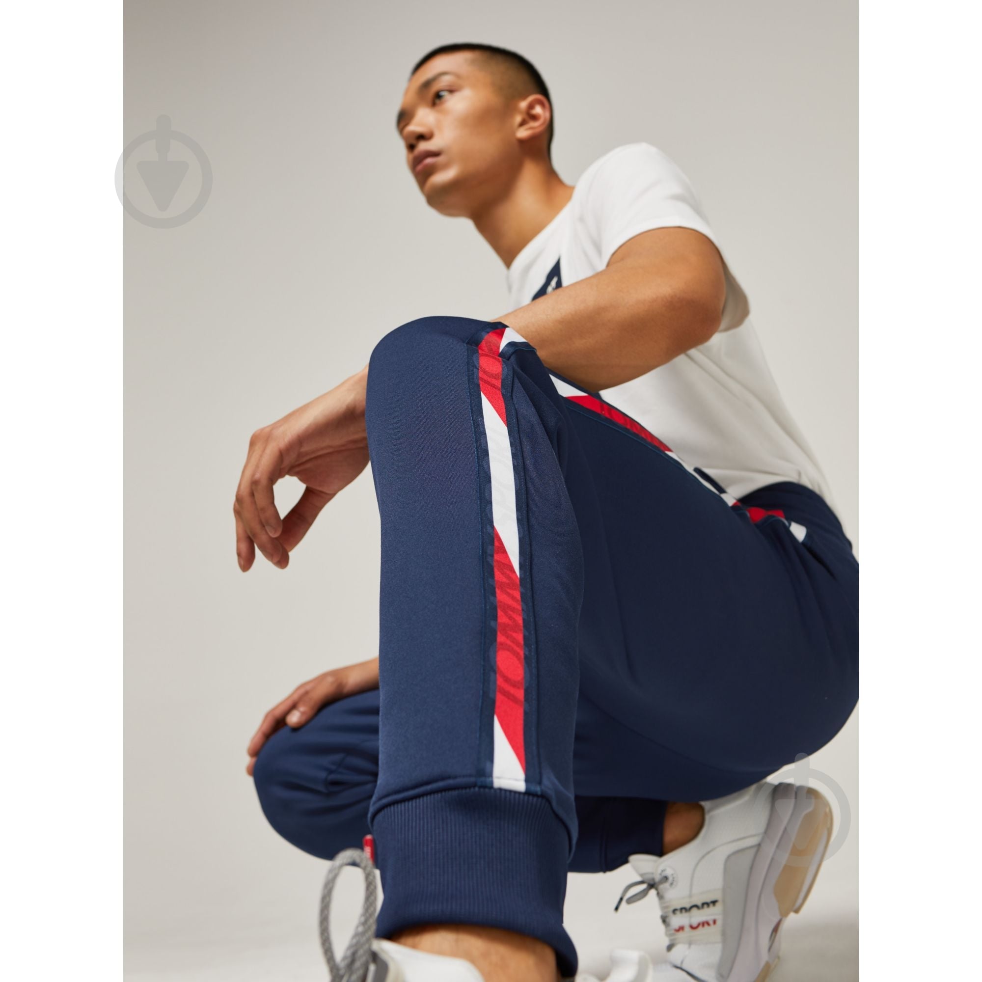 Штани Tommy Hilfiger FLEECE TRACK PANT WITH TAPE S20S200294401 р. M темно-синій - фото 3