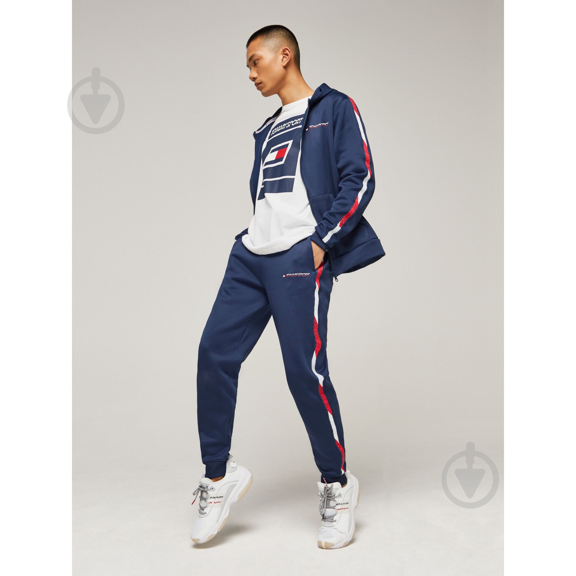 Брюки Tommy Hilfiger FLEECE TRACK PANT WITH TAPE S20S200294401 р. S темно-синий - фото 4