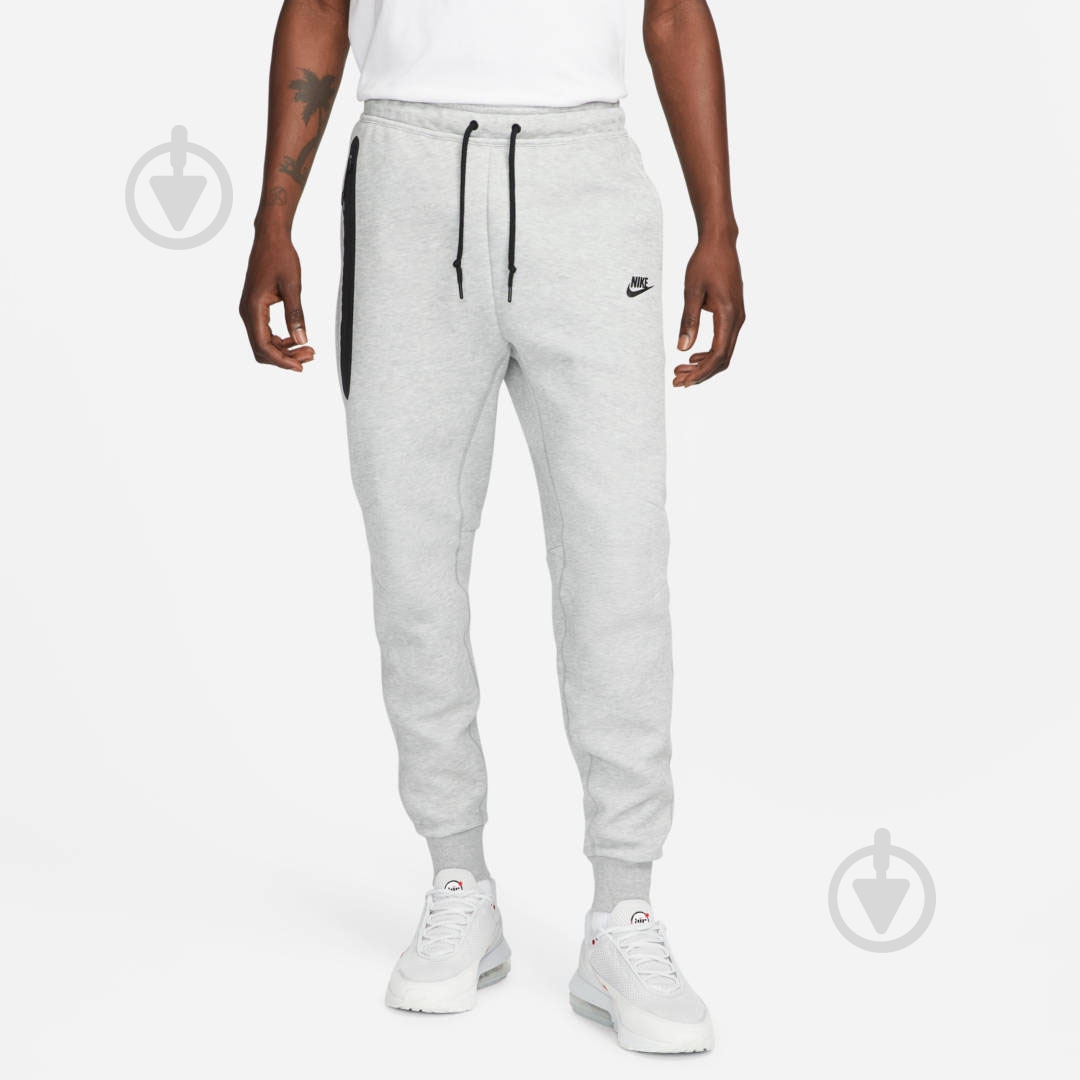 Брюки Nike M NK TCH FLC JGGR FB8002-063 р. XS белый - фото 1