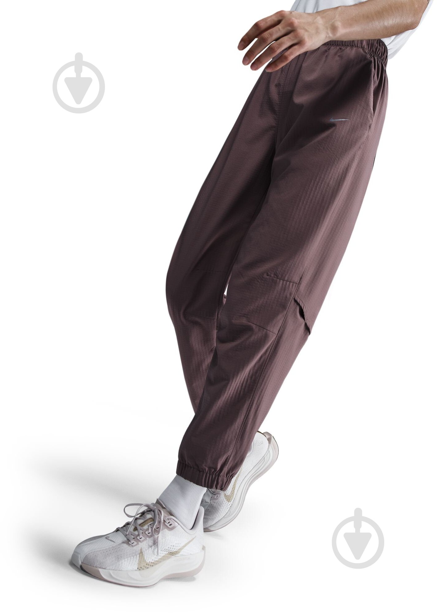 Штани Nike W NK FAST DF WRM MR 7/8 PNT FB7730-214 р. M коричневий - фото 4