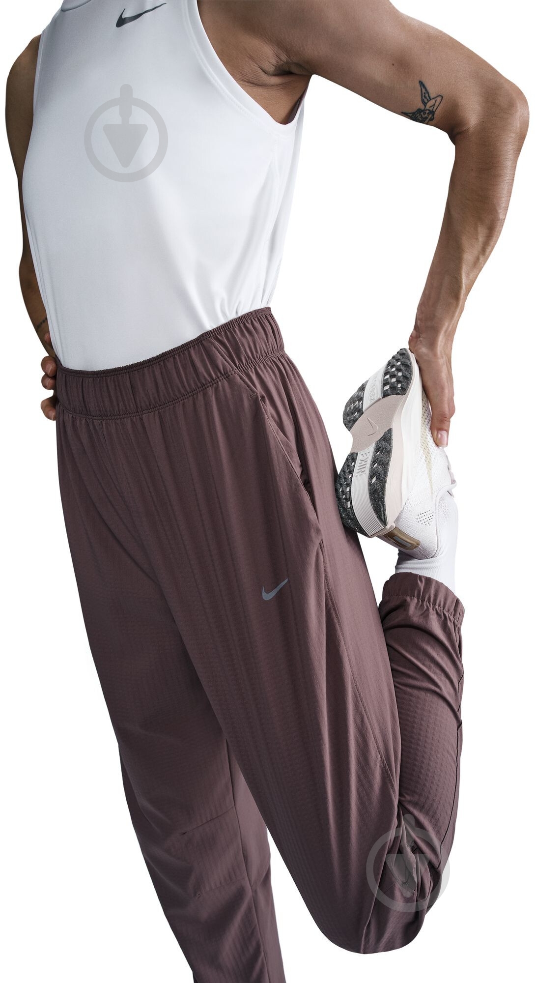 Штани Nike W NK FAST DF WRM MR 7/8 PNT FB7730-214 р. XL коричневий - фото 6