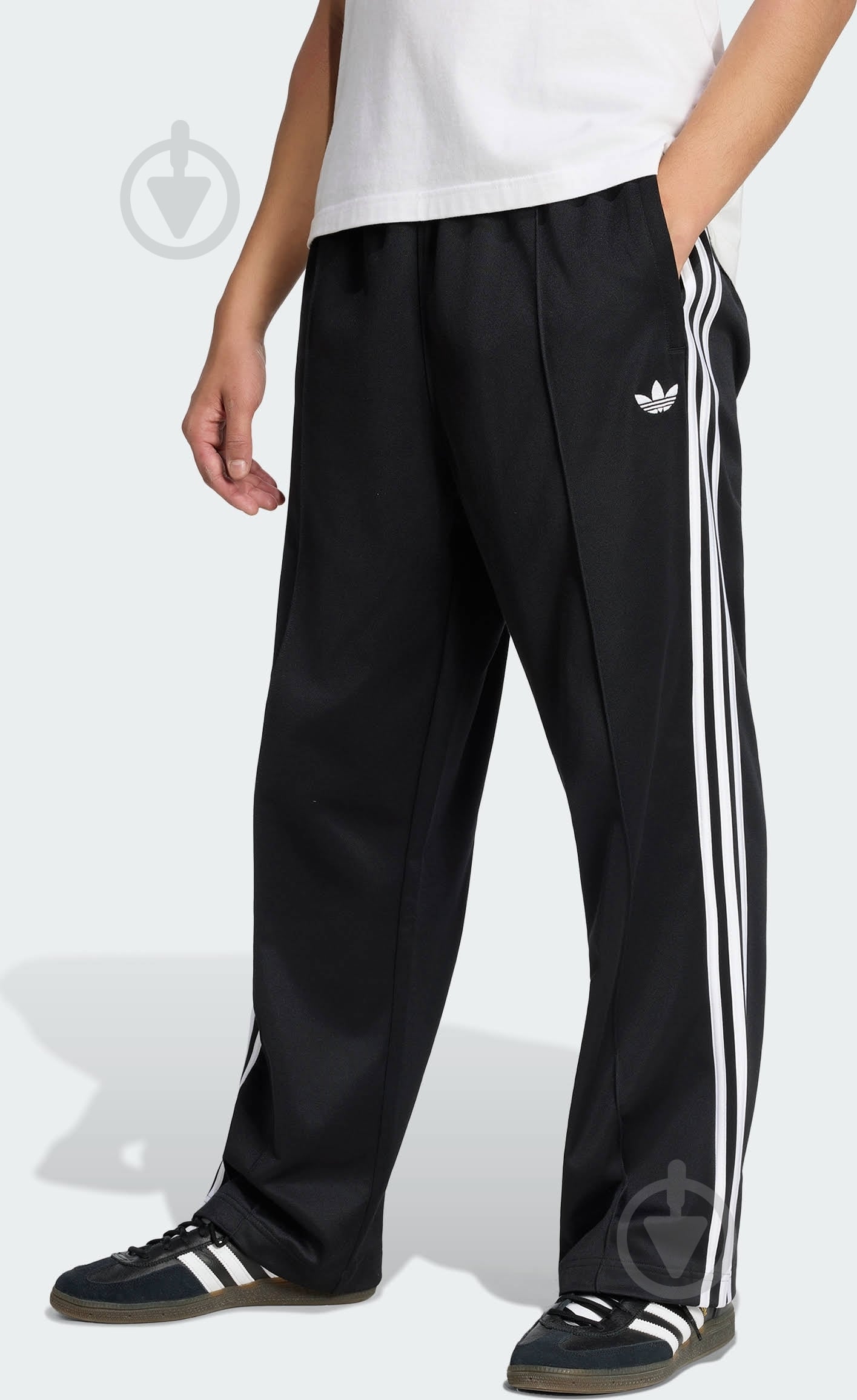 Штани Adidas FIREBIRD TP KD8315 р. L чорний - фото 1