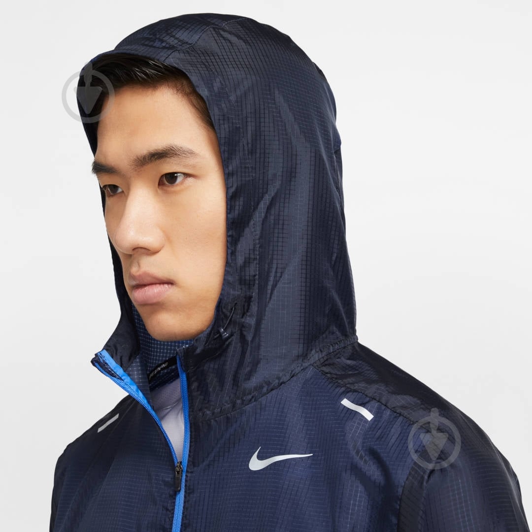 Ветровка мужская Nike M NK WINDRUNNER JKT CK6341-402 р.S голубая - фото 5 Ветровка мужская Nike M NK WINDRUNNER JKT CK6341-402 р.S голубая - фото 5