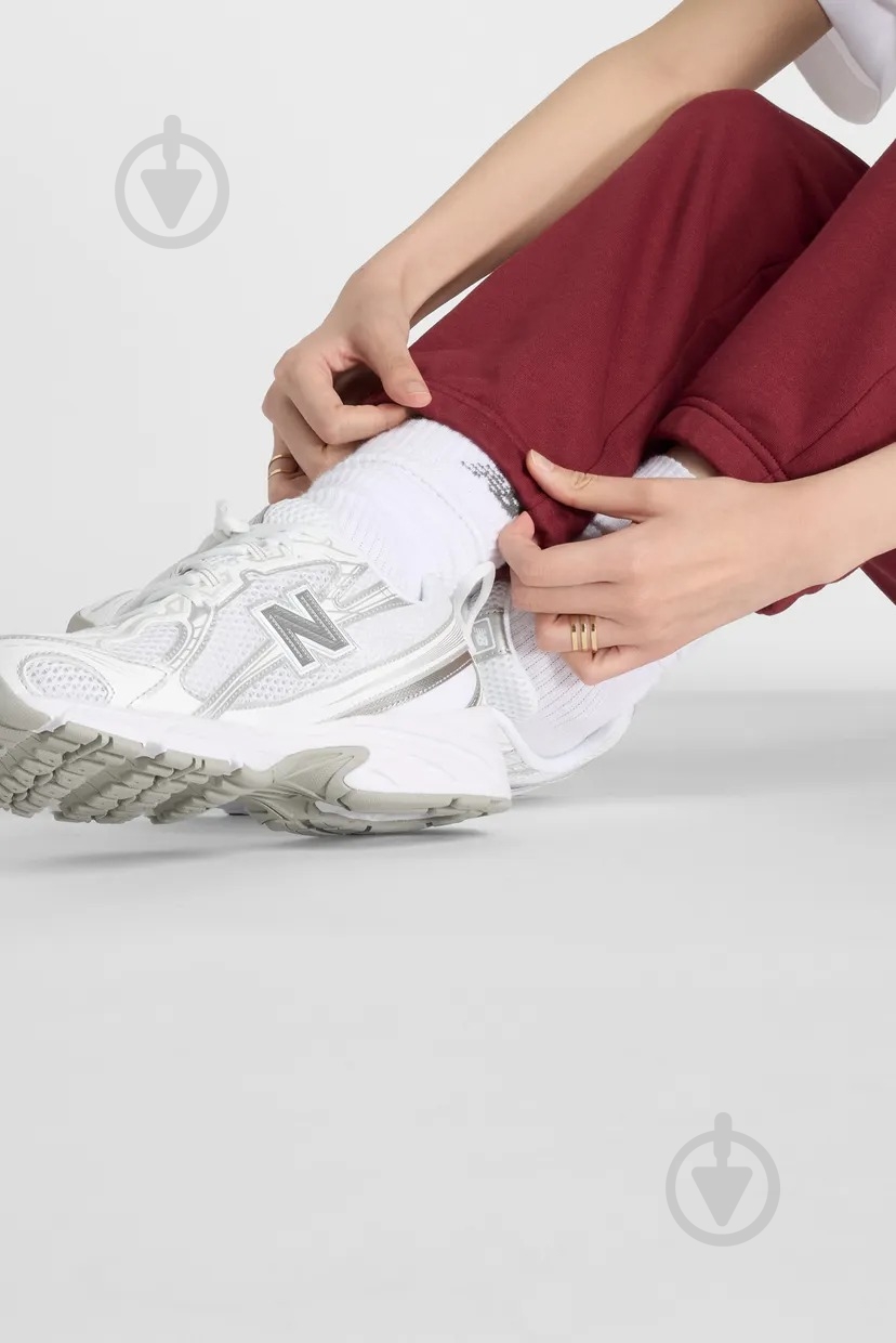 Штани New Balance ESSENTIALS WP41500-MHB р. M - фото 6 Штани New Balance ESSENTIALS WP41500-MHB р. M - фото 6