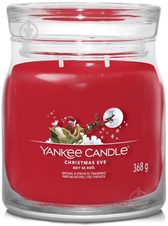 Свеча ароматическая Yankee Candle Christmas Eve (Сочельник) Medium (1631837E) - фото 1