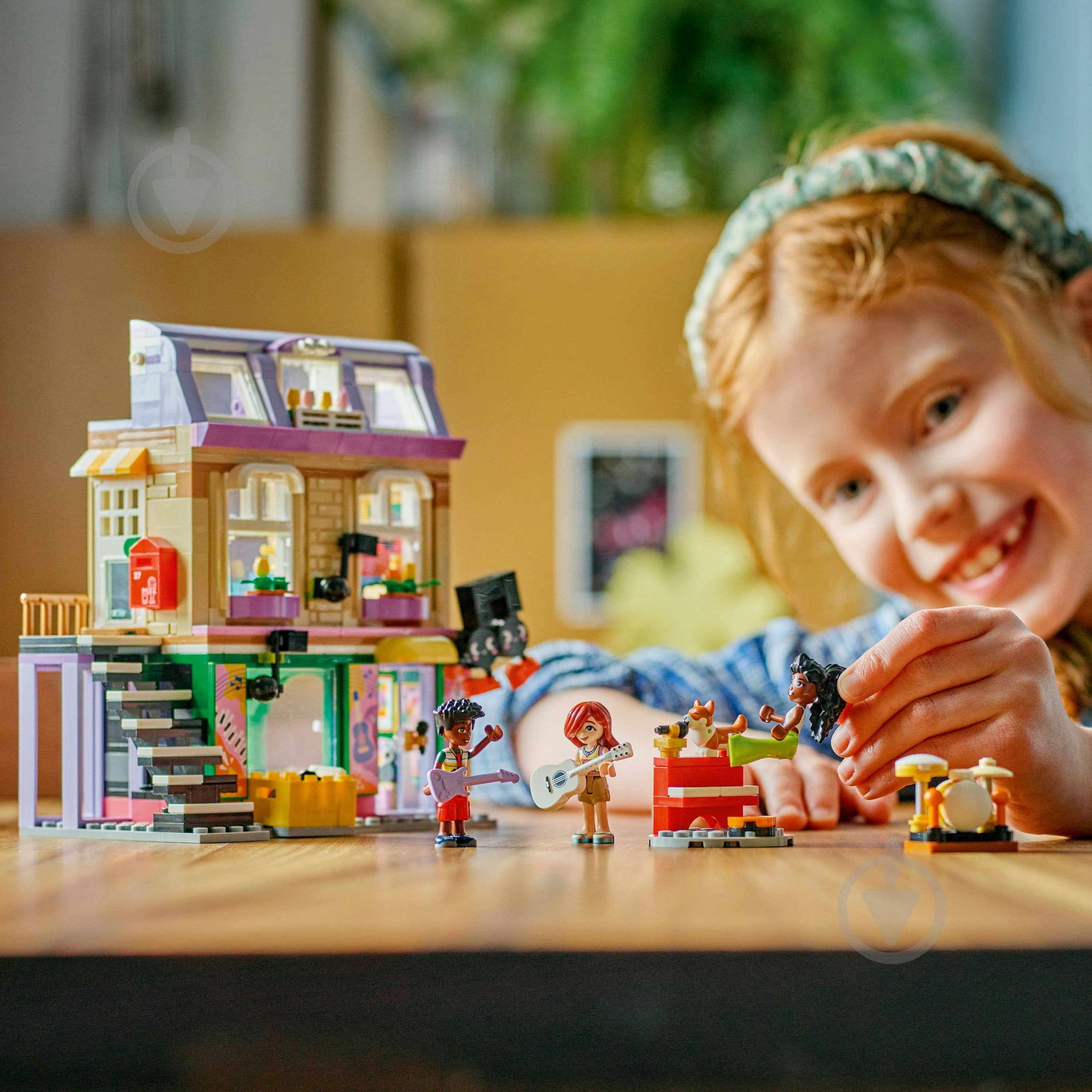 Конструктор LEGO Friends Музична крамниця і квартира 42653 - фото 4